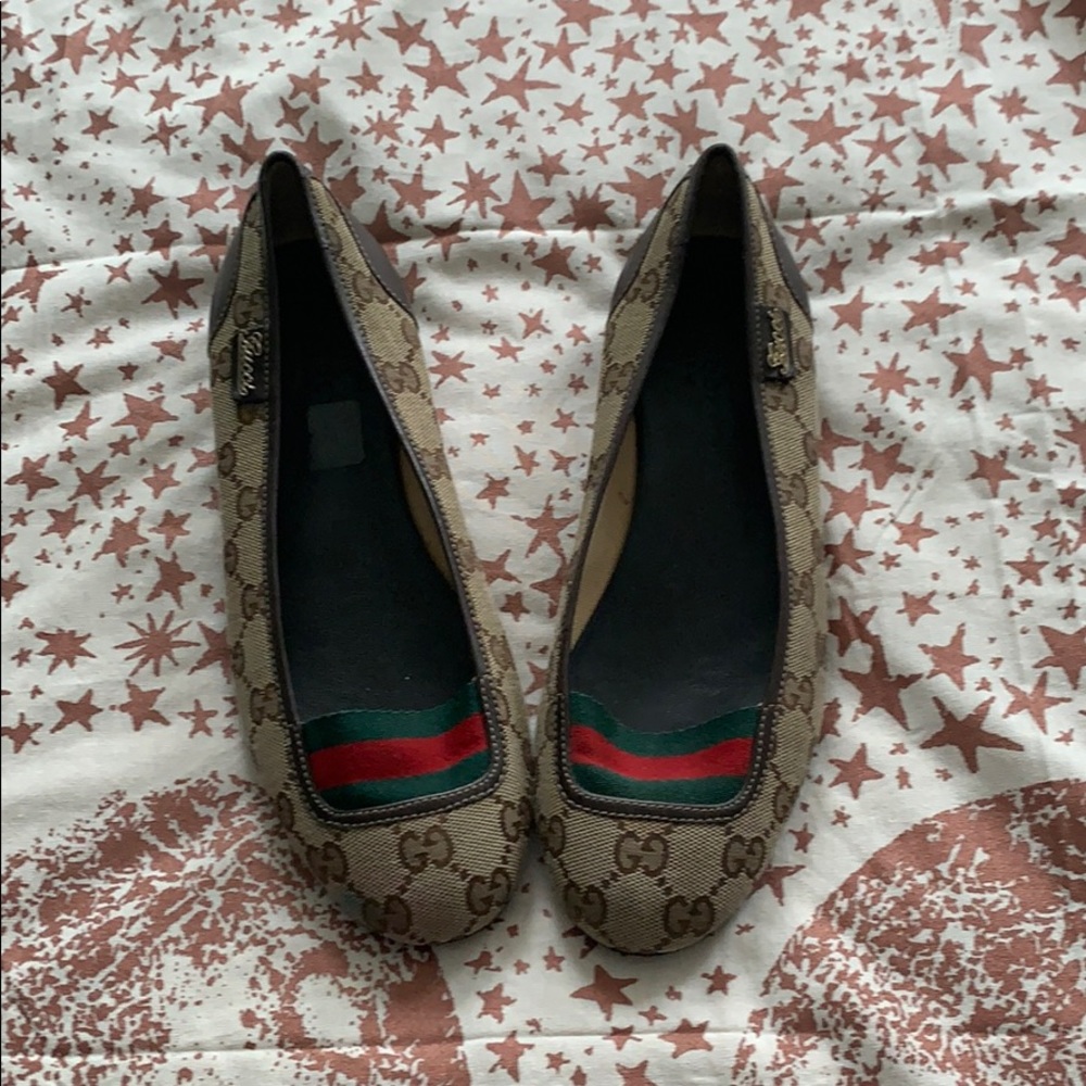 Gucci monogram slip ons